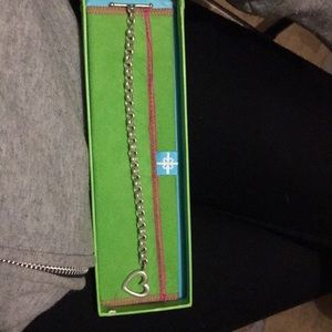 A matching set of silver necklace and bracelet